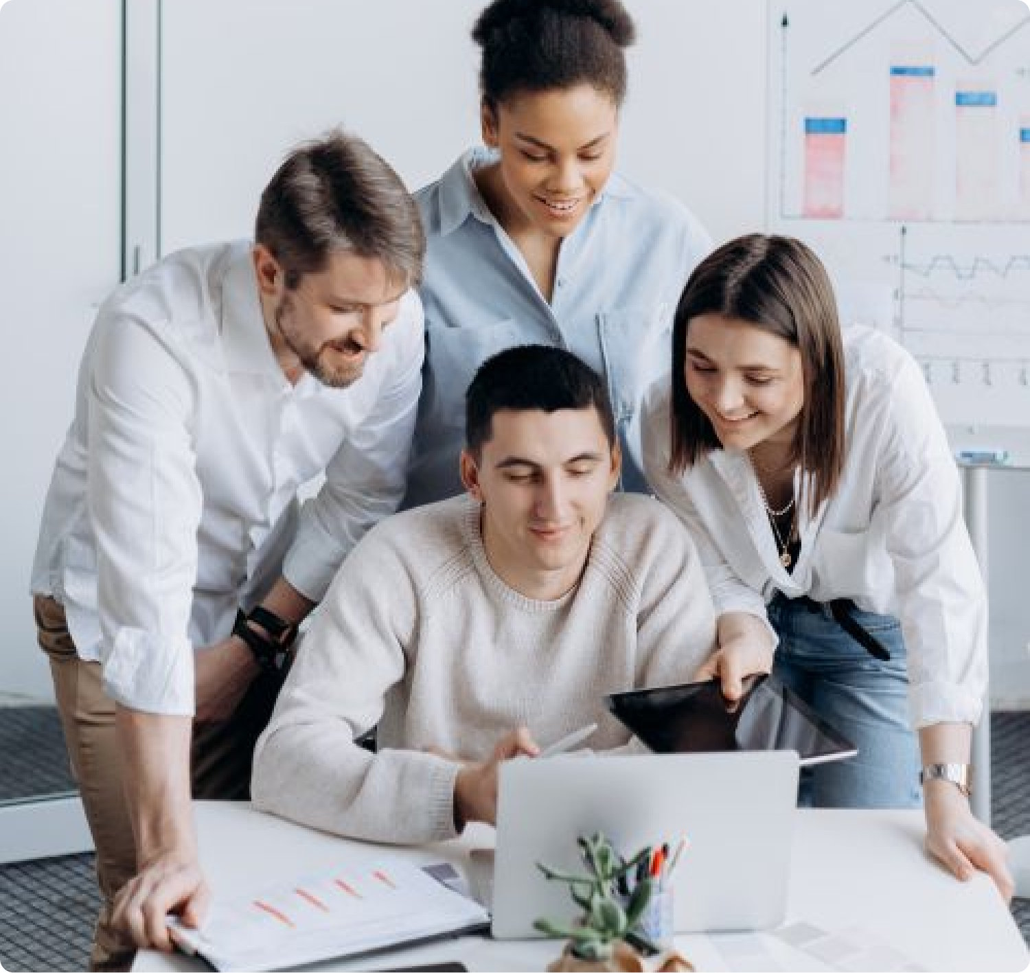 Photo of team collaborating on project